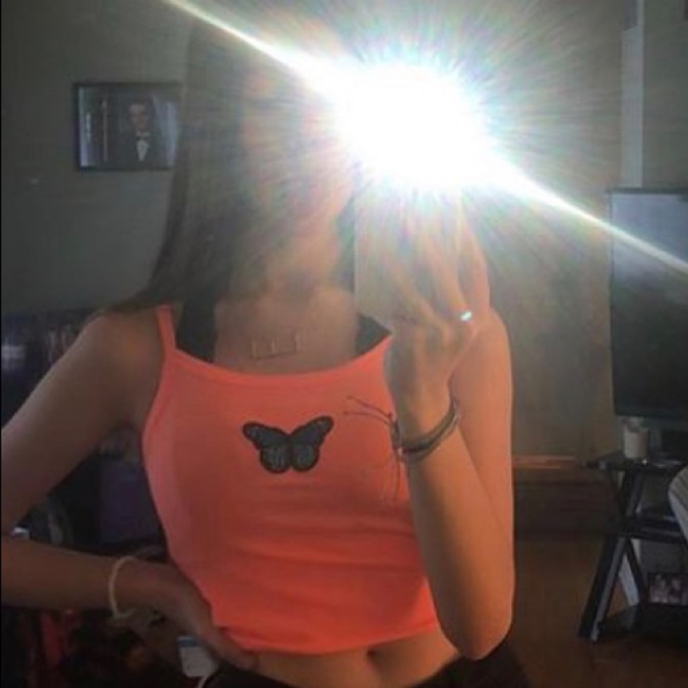 cropped neon orange tank top with blue butterfly